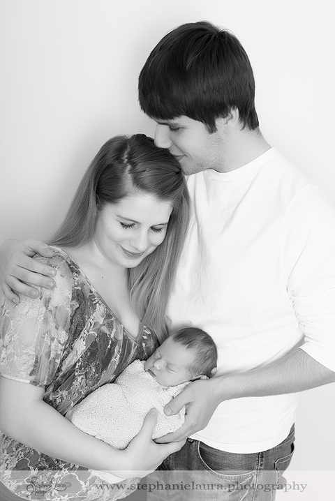 newborn girl with parents