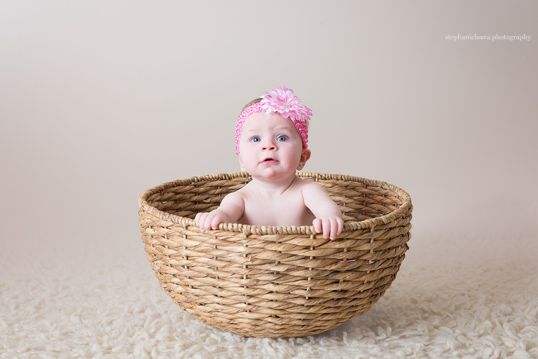 baby in basket photography